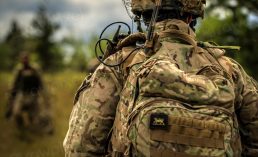 A British soldier marches toward his