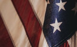 us a flag on white and red textile